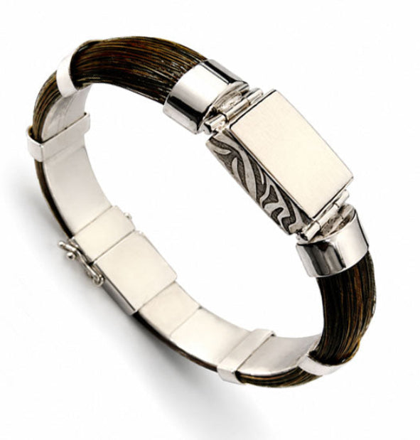 pulsera pelo de faochero africano natural en forma media caña con centro rectangular colmillo natural en plata de ley vista lateral