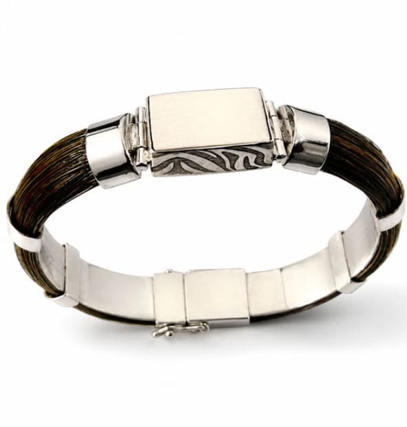 pulsera pelo de faochero africano natural en forma media caña con centro rectangular colmillo natural en plata de ley