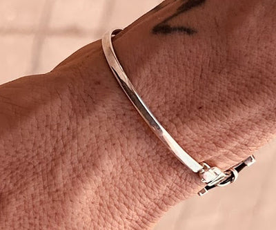 Pulsera-cruz-pelo-de-bufalo-con-plata-2