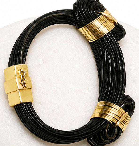 Pulsera Gruesa 2 Nudos Corredizos de Pelo de Búfalo con Oro 18 Kilates y Cierre