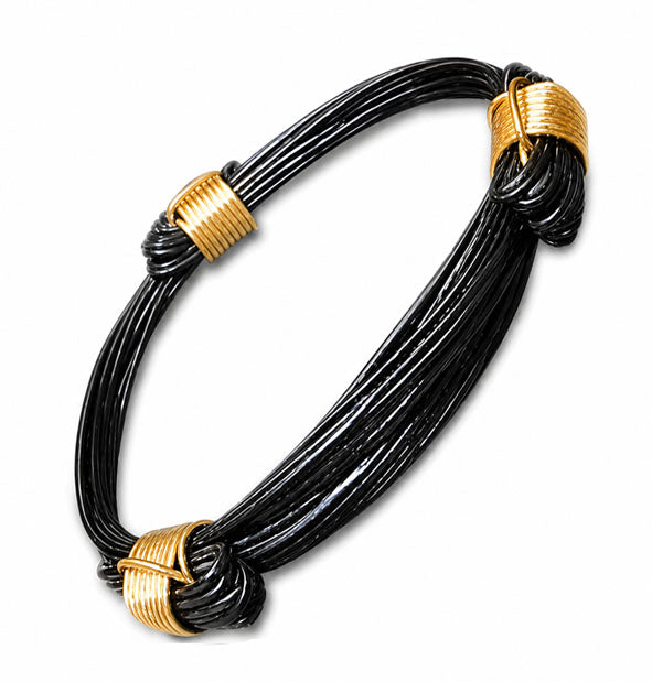 Pulsera 3 Nudos Corredizos de Pelo de Búfalo con Oro 18 Kilates detalle de los nudos
