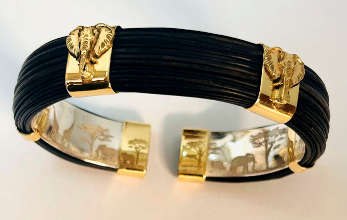 pulsera-ancha-plana-pelo-bufalo-con-2-cabezas-de-elefantes-en-oro-amarillo-18-kilates-foto-25