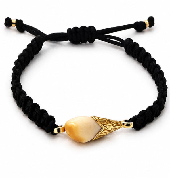 Pulsera Campanita Perla de Venado con Algodón y Oro 18 Kilates