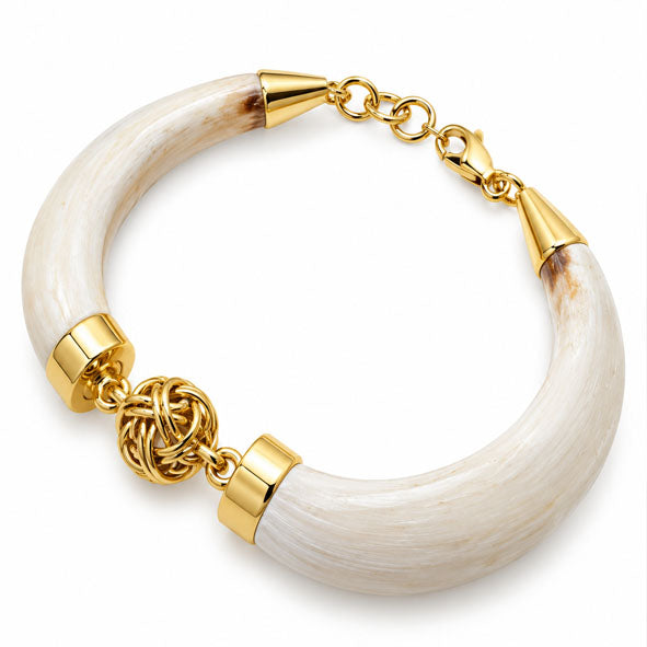 Pulsera de colmillo de jabalí con bolita en oro de 18 quilates 