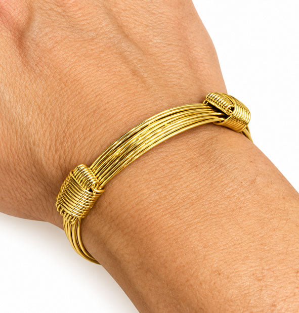 sliding knot bracelet 9 strands in 18 carat gold