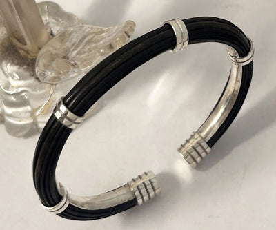 pulsera-pelo-bufalo-tubo-redondo-7-mms-asas-dobles-abierto-con-plata-foto-11