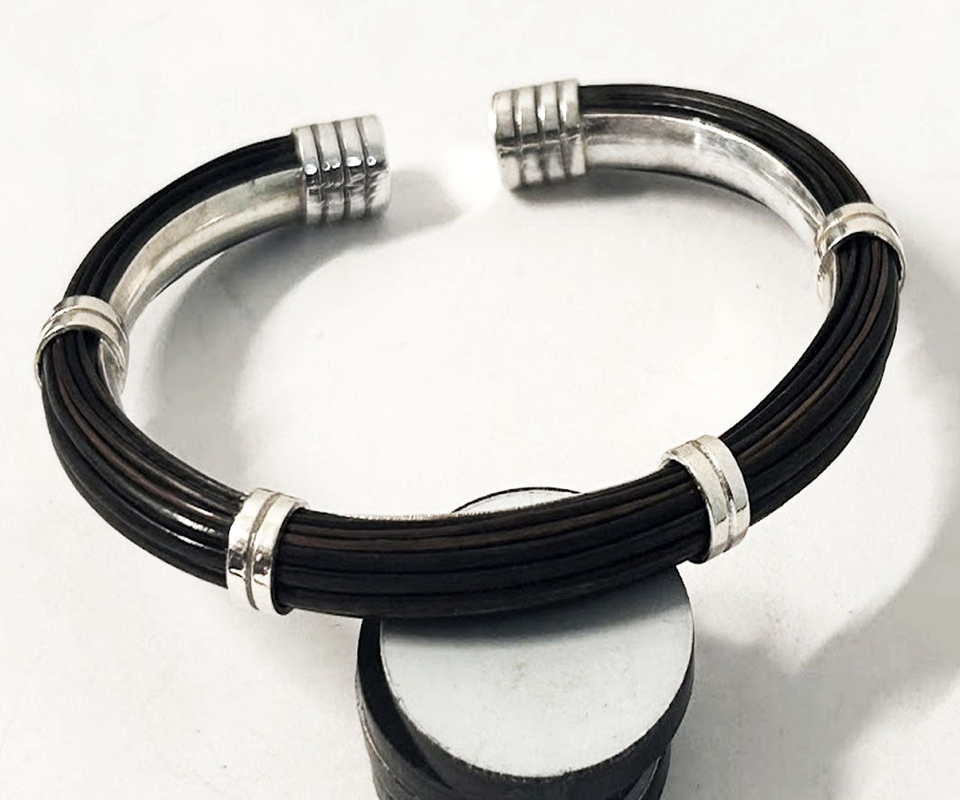 pulsera-pelo-bufalo-tubo-redondo-7-mms-asas-dobles-abierto-con-plata-foto-12
