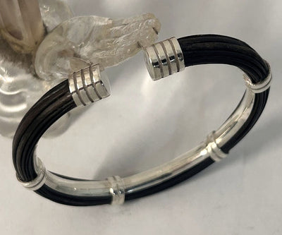 pulsera-pelo-bufalo-tubo-redondo-7-mms-asas-dobles-abierto-con-plata-foto-13