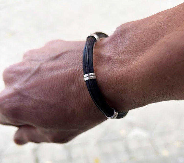 pulsera-pelo-bufalo-tubo-redondo-7-mms-asas-dobles-abierto-con-plata