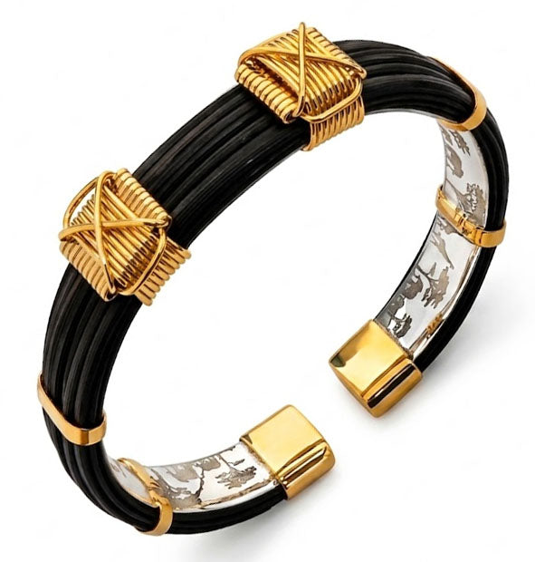 pulsera plana con 2 nudos africanos en Oro 18 kilates con pelo de Bufalo
