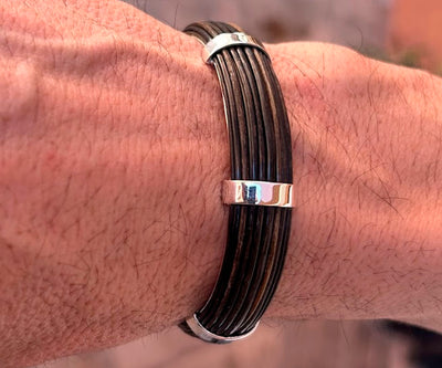 pulsera-rigida-media-cana-pelo-bufalo-en-plata-14-mms-ancho