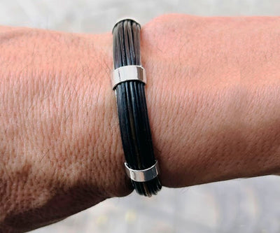 pulsera-rigida-media-cana-pelo-bufalo-en-plata-9-mms-ancho-foto-3