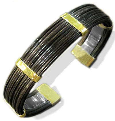 pulsera ancha plana pelo bufalo en oro 18 kilates y base plata