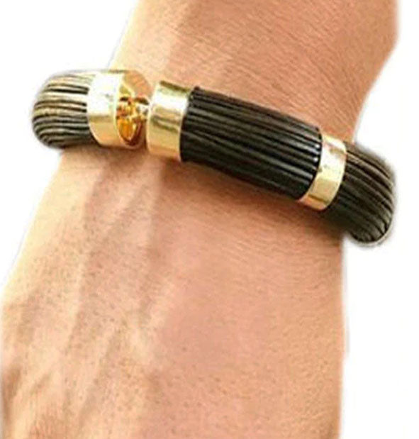 pulsera gruesa tubo redondo pelo bufalo 14 mms oro