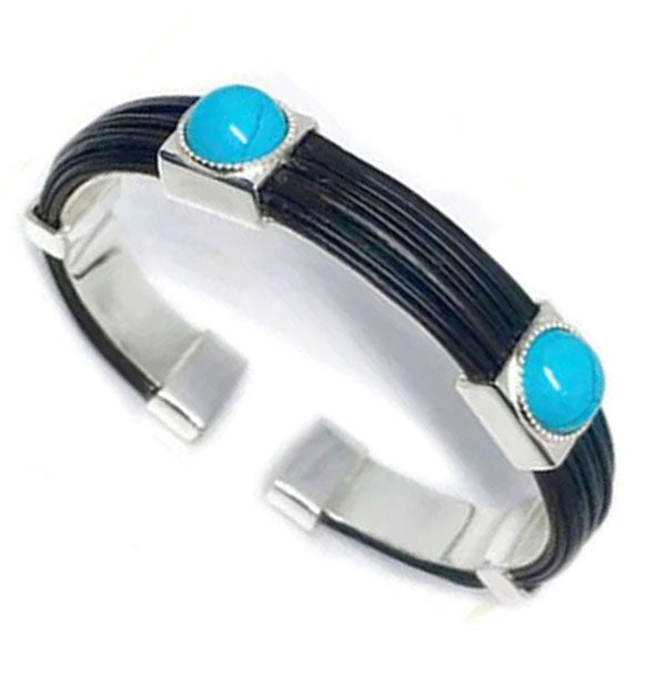 pulsera rigida plana pelo bufalo con turquesas en plata
